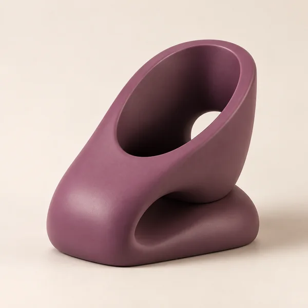 Objeto conceptual orgánico púrpura con una cavidad inclinada.